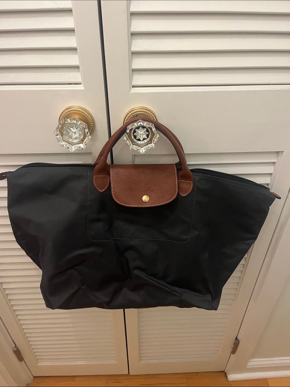 Longchamp Black Travel Bag with Brown Leather Handles
